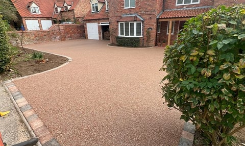 Tiled driveway with curved entrance